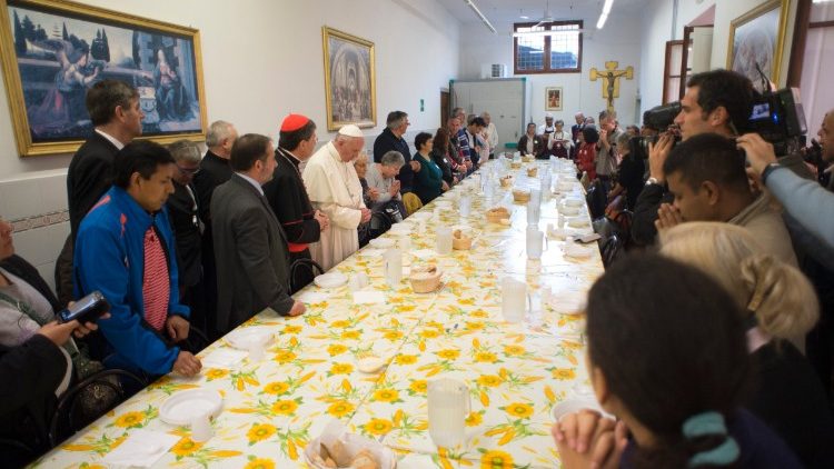 Pope Francis at lunch with the poor