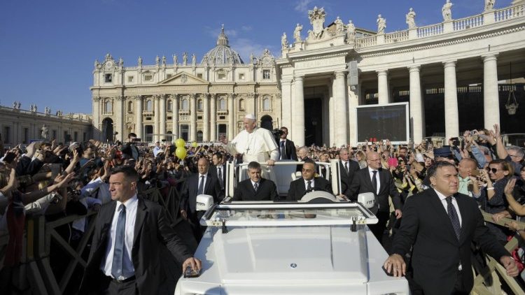 Pope Francis greets pilgrims in St Peter's square prior to the Wednesday General Audience