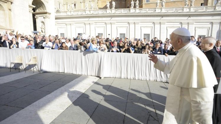 Pope Francis greets pilgrims in St Peter's Square during the weekly general audience