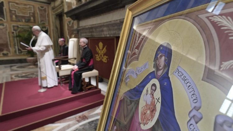 Pope Francis with an icon of "Our Lady, Help of Persecuted Christians"