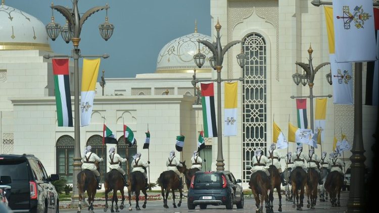 An equestrian procession accompanies Pope Francis' arrival at Presidential Palace