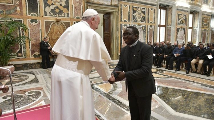 Pope Francis greets members of the Missionaries of Africa