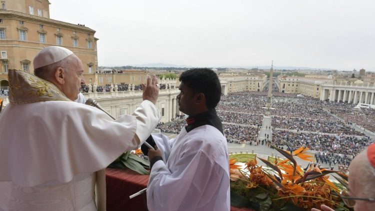 Pope Francis imparts his Apostolic Blessing at the Easter Urbi et Orbi