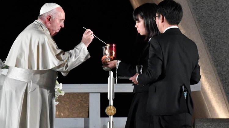 Pope Francis lights a candle at the Hiroshima Peace Memorial in Japan