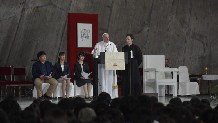 Leonardo, Masako, and Miki listen to Pope Francis at the Meeting with Young People