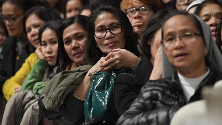 Members of the Filipino community attend Mass in St Peter's Basilica