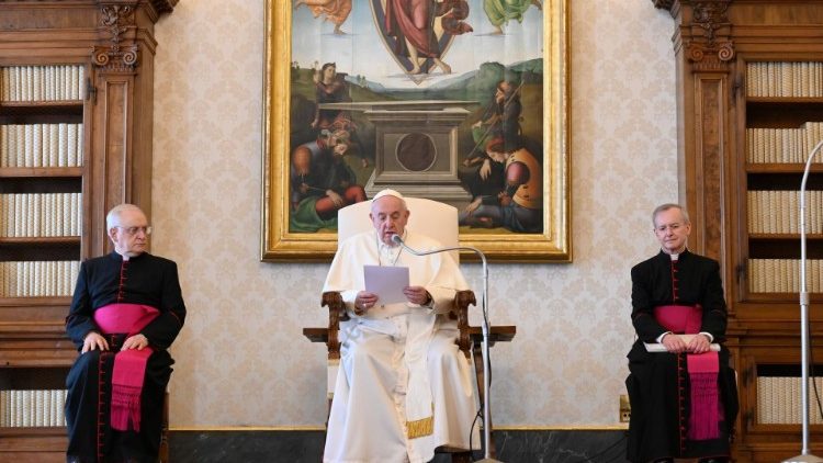 Pope Francis during a General Audience in March, livestreamed from the Library of the Apostolic Palace