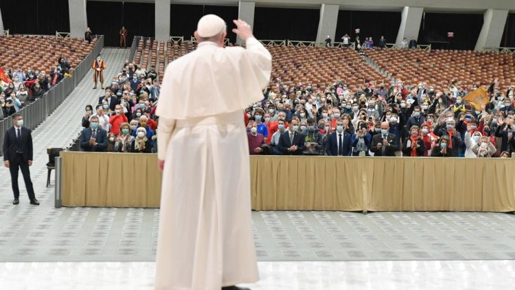 Pope Francis greeting General Audience participants from afar