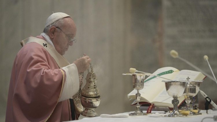 Pope Francis incenses the altar