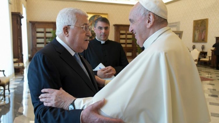 Pope Francis embraces Palestinian President Mahmoud Abbas