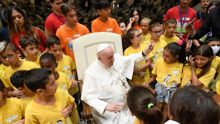 Pope Francis welcoming the children attending the summer kids camp at the Vatican