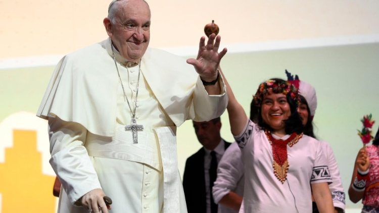Pope Francis waves to young people in Assisi