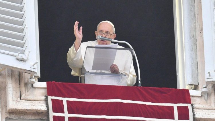 Pope Francis waves to the faithful in St. Peter's Square