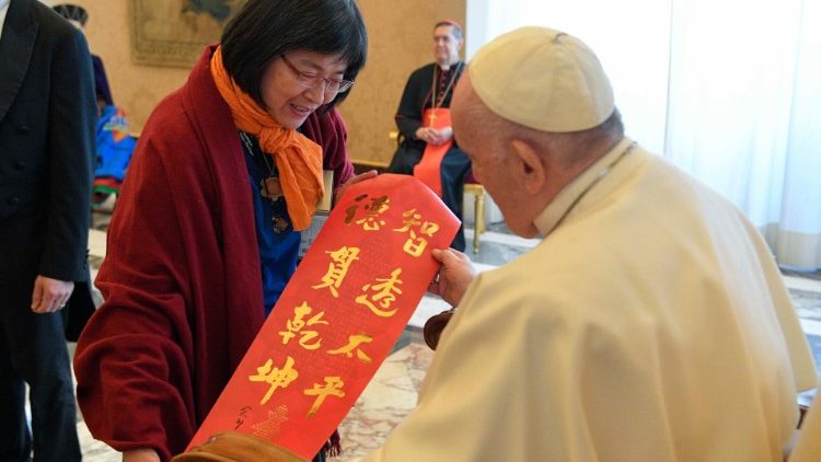 MAP Francis greets one of the participants at the conference