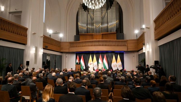 Civil servants listen to the Pope at the former Carmelite Monastery