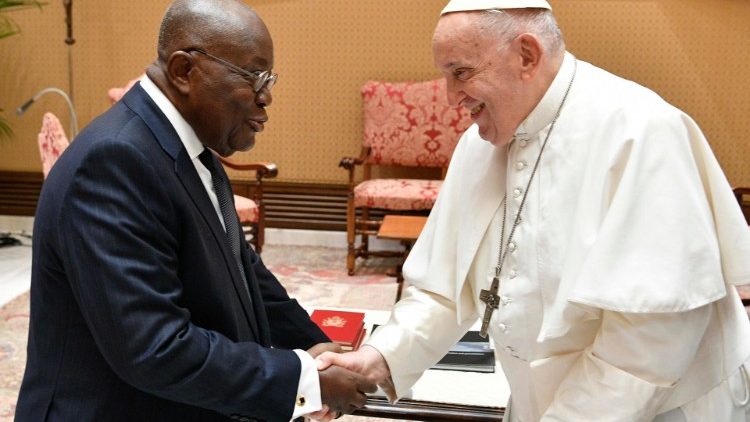 MAP Francis shakes hands with Ghana's President Nana Addo Dankowa Akufo-Addo