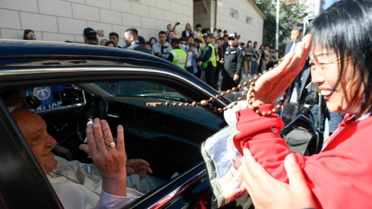 Waving goodbye to a cheerful faithful
