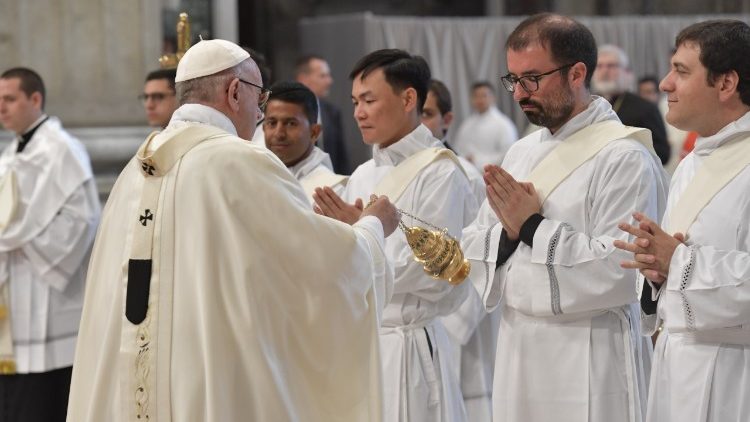 Pope Francis incenses deacons during the Mass of Ordination at St Peter's Basilica