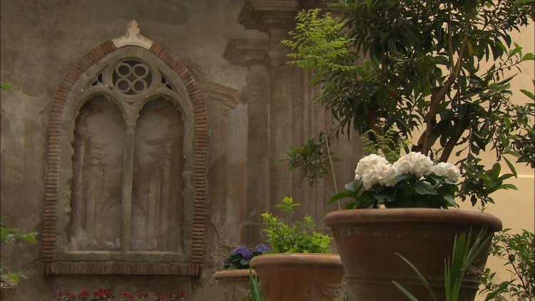 Gothic window in College garden.jpg