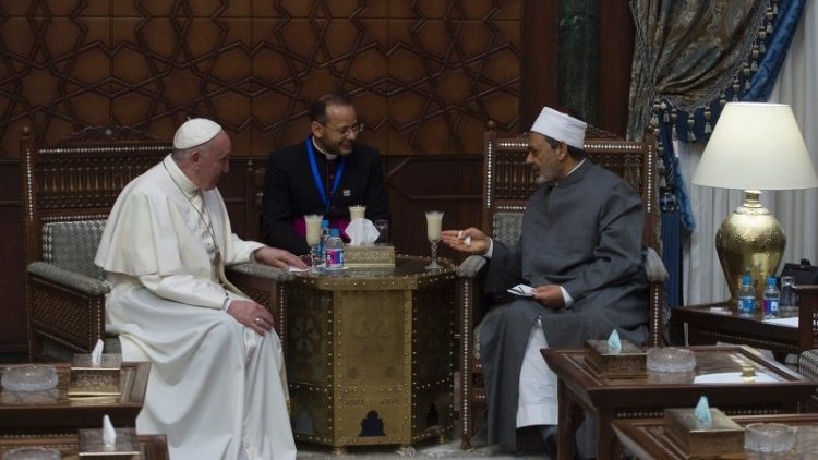 Pope Francis talks with Grand Imam Ahmed el-Tayeb of al-Azhar university in Cairo