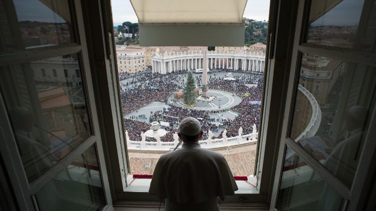 Pope Francis looks out over the crowds in St Peter's Square, as he prays for victims of terror attacks in Afghanistan.