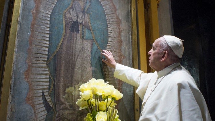 Pope Francis prays before Our Lady of Guadalupe