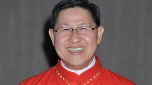 An emotional Cardinal Tagle receives blessing of Filipino faithful