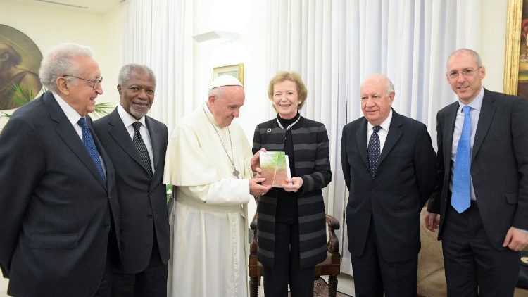 Pope Francis meeting the former UN Secretary General, Kofi Annan and other members of the Elders, a group of global leaders.