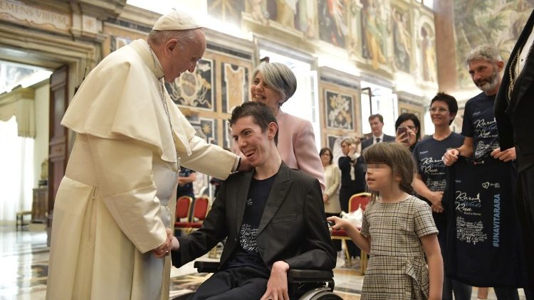 Pope Francis greets Davide and members of Una Vita Rara