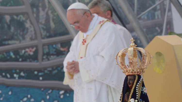 Pope Francis prays during the WYD in Brazil