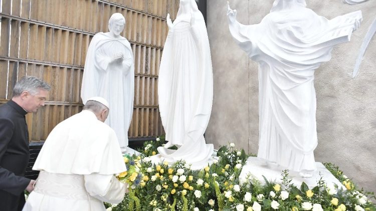 Pope Francis kneels in prayer at Knock Shrine in 2018