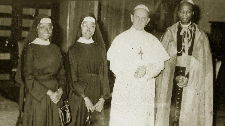 Sisters Petronilla Mukagoa (extreme left) and Laurina Kokutona accompanied by Cardinal Laurean Rugambwa (extreme right)