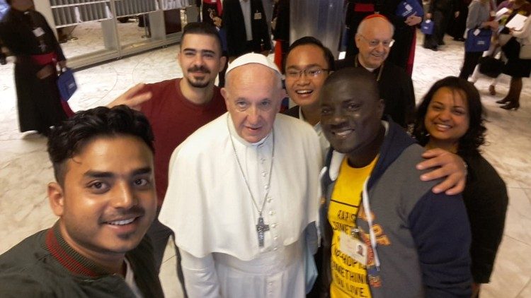 Pope Francis and young people at the Synod of Bishops in the Vatican.