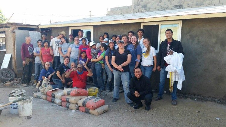 Fr Jesse Esqueda (kneeling, right) with a group at the Oblate Mission of La Morita, near Tijuana, Mexico (photo: Oblate Youth Mission)