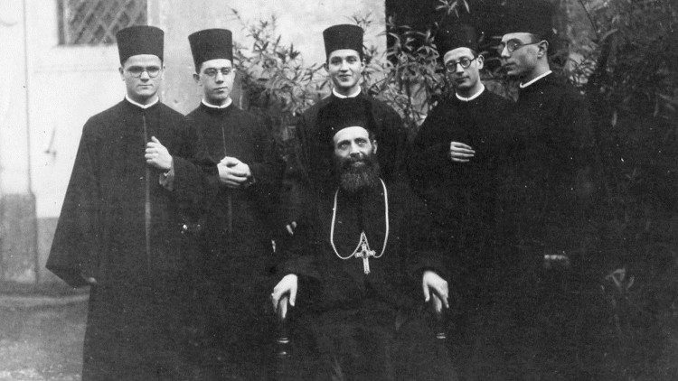Bishop Giovani Mele (C), first bishop of Lungro, with several priests