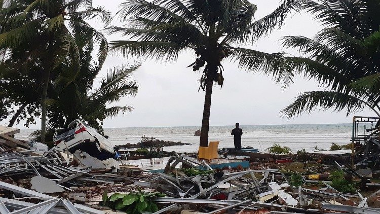 a-man-stands-among-ruins-after-a-tsunami-hit--1545556130443.JPG