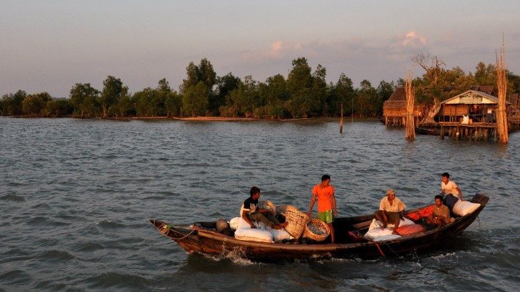 Locals ply Myanmar's Irrawaddy River