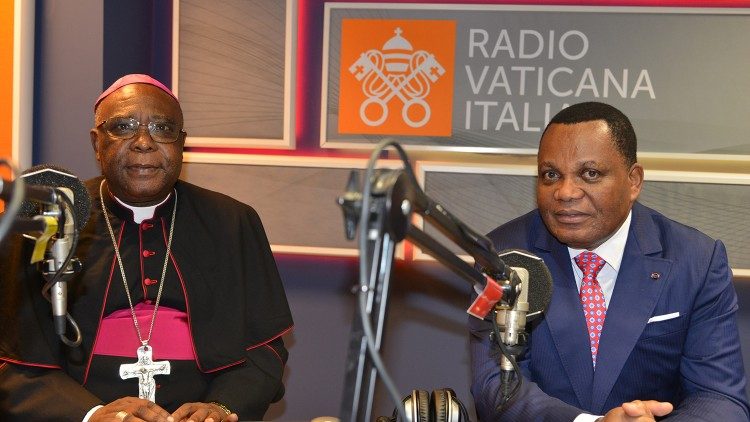 Congo-Brazzaville Foreign Minister Jean-Claude Gakosso (R) and Bishop Daniel Mizonzo