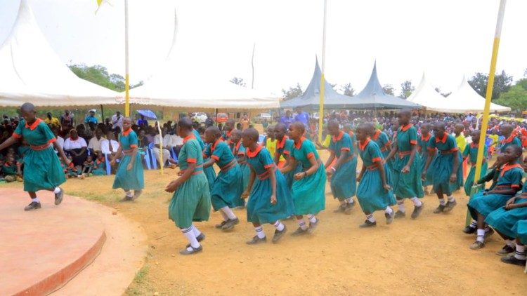 Sirimba Parish school children celebrate the inauguration of their hotel