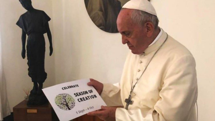 Pope Francis marking last year's Season of Creation