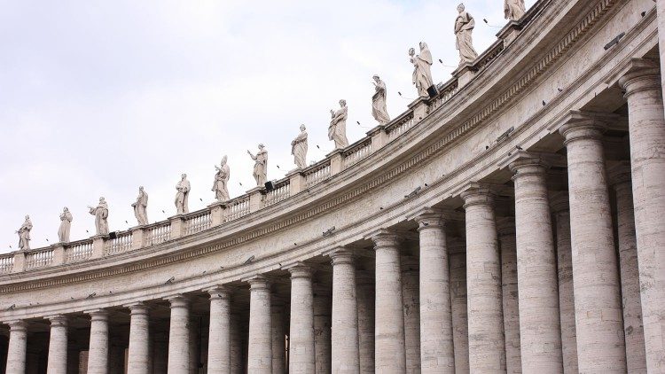 Statues of saints atop the colonade of St. Peter's Square in Rome. 
