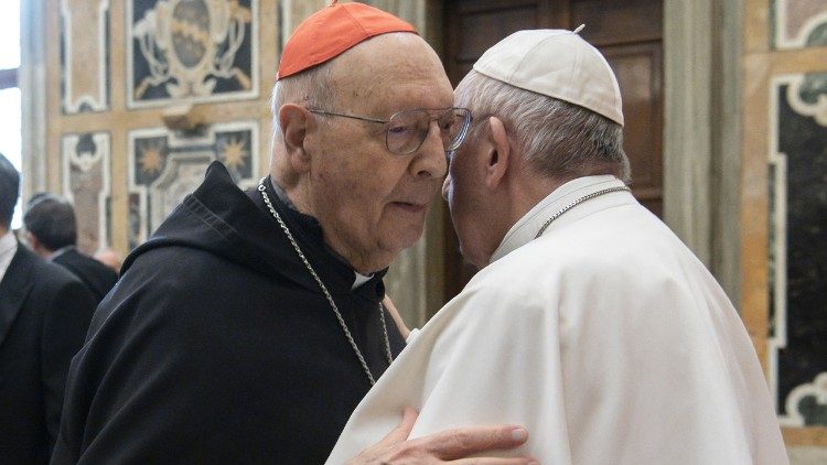Pope Francis greets Cardinal Prosper Grech in February 2019