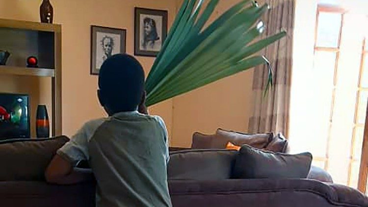Louis in Zimbabwe, eagerly waiting for Palm Sunday in the family   