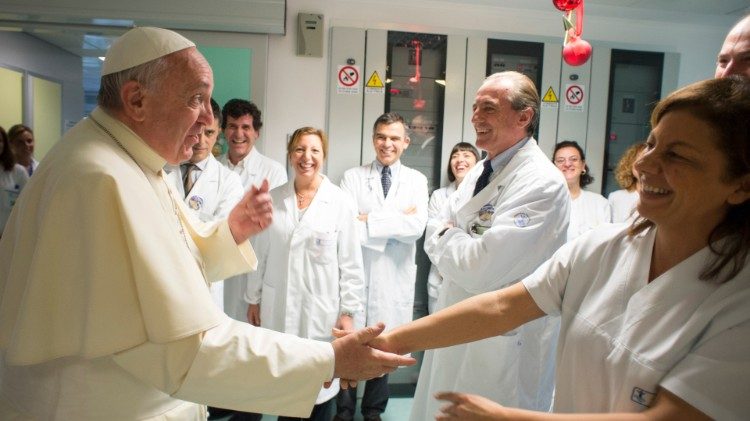Pope Francis visits healthworkers at Bambino Gesù pediatric hospital in Rome on International Nurses Day in 2013