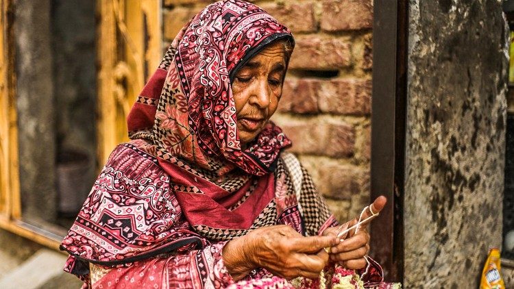 A poor woman who has been helped by Akhuwat 