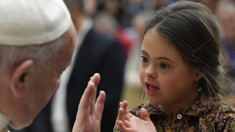 Papst Franziskus und ein Kind