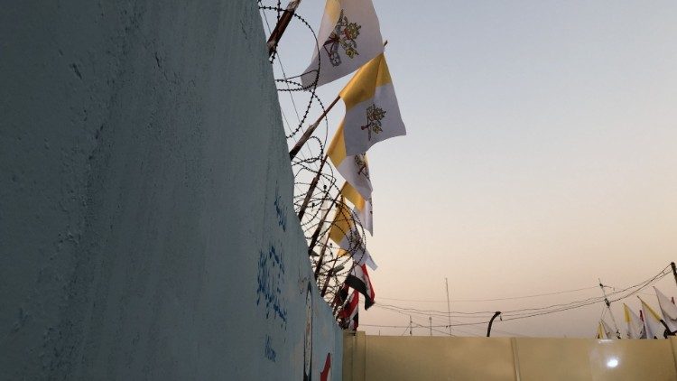 Flags on fences with barbed wires