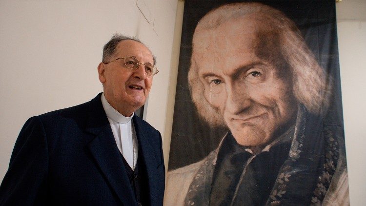 Congregation for the Clergy - Cardinal Stello next to a photo of Saint John Vianney