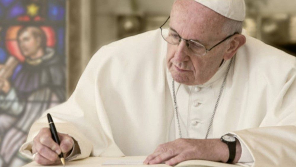 Imagen de archivo: el Papa escribe una carta.