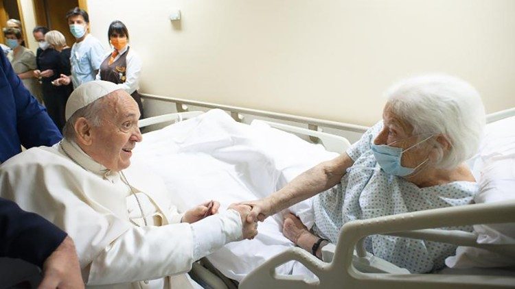 Pope Francis visits an ailing woman during his stay at Gemelli hospital